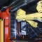 Extraction robot mounted on a plastic injection molding machine